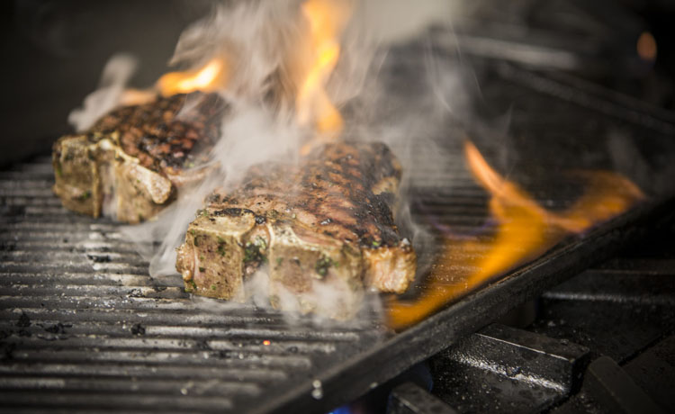 GRILLED NEW YORK STEAK WITH CRISPY BUTTERMILK SWEET ONIONS & BLACK-EYE PEA SUCCOTASH